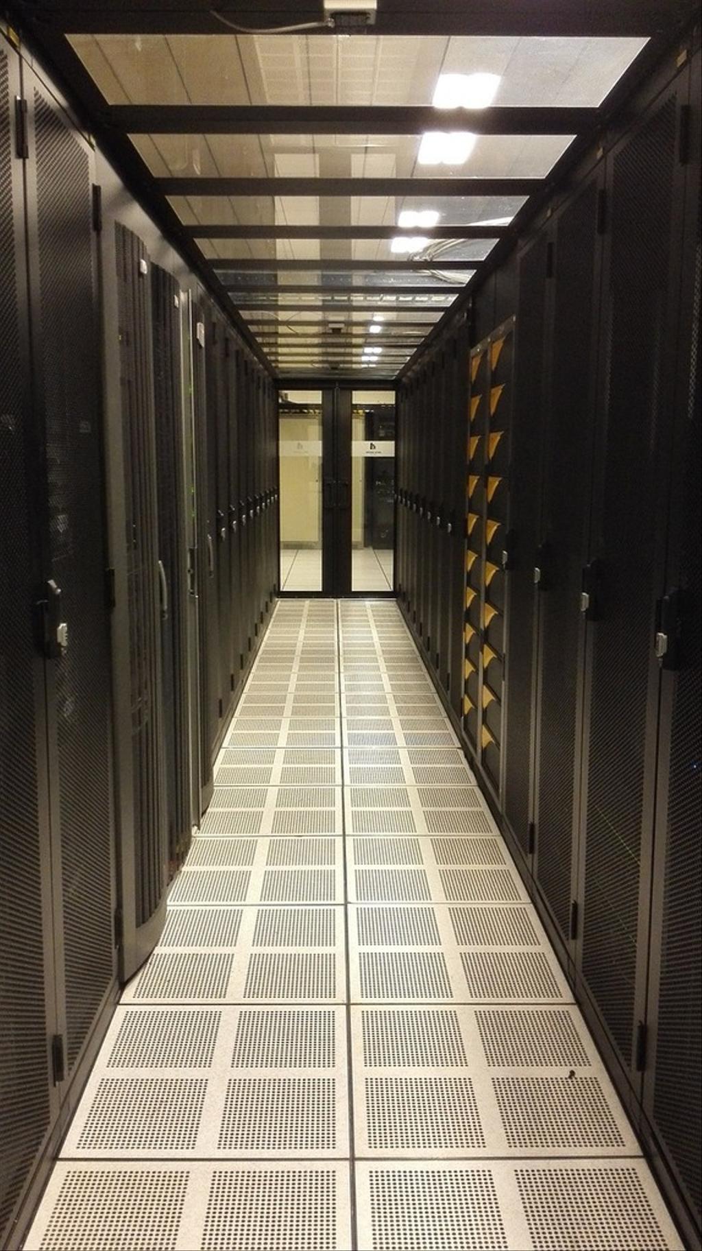 A real data center aisle lined with server racks